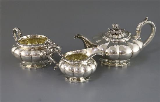 A George IV silver three-piece melon-shaped tea service, London 1827, Rebecca Eames & Edward Barnard I, gross 42.5 oz.